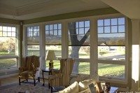 Oasis® 2900 exterior sun shades on grey house seen from the interior exterior window shade seen from the interior of the house