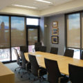Insolroll commercial solar shades conference room glare control