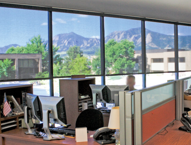 Insolroll commercial solar shades office with a view