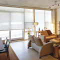 City condo white solar shades light filtering living room